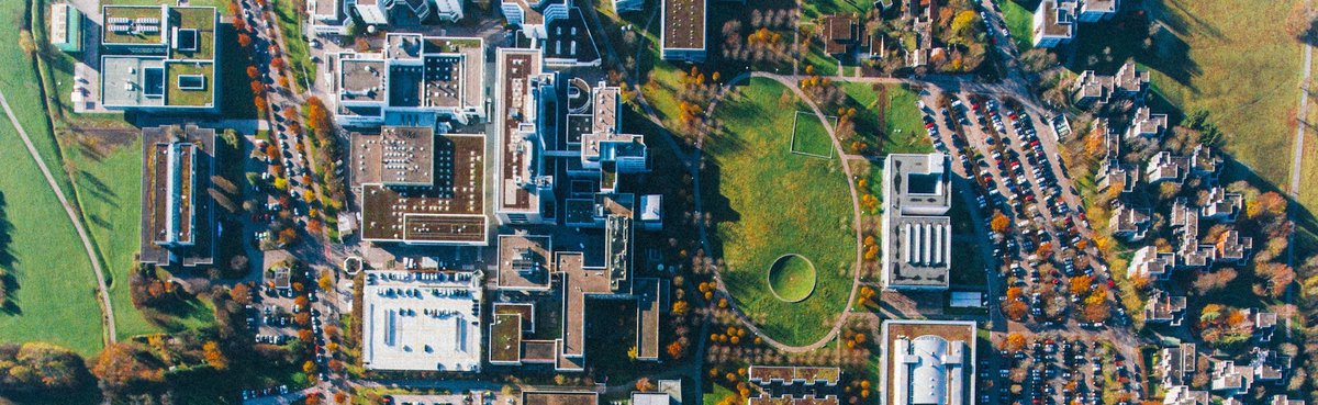 aerial city max-boettinger-448557-unsplash wide.jpg